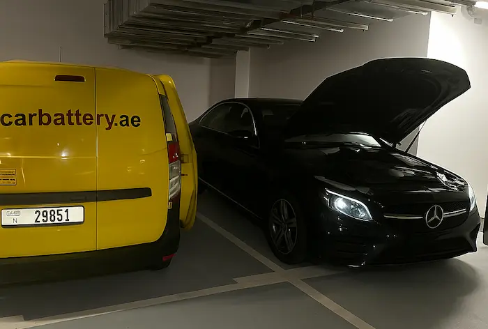 Mercedes-Benz car parked on city street